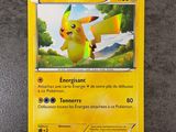 a close up of a pokemon card on a table