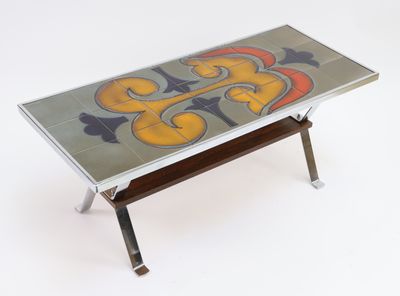 a glass table with a colorful design on it