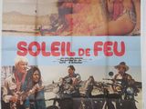 Affiche française du film « Soleil de feu », représentant une femme à moto et un homme