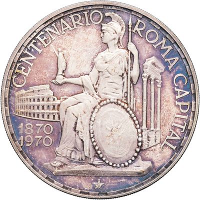 an image of a silver coin with a statue of a woman sitting on a throne