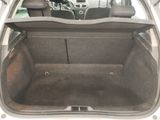 a trunk of a car with the back seats folded down