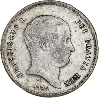 Gros plan sur une pièce de monnaie portant le visage d'un homme