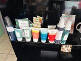 many different types of skin care products displayed on a shelf