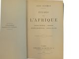an open book with a black and white image of the title of the book