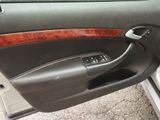 the interior of a car with the door open and a key in it