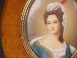 a picture of a woman in a blue dress and a red feather