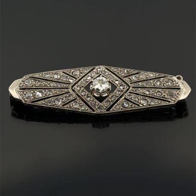 an art deco diamond broochle