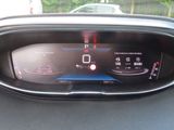 the dashboard of a car with a digital display in the center