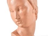 sculpture of a woman ' s head on a white background