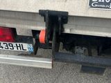 a close up of a truck with a license plate on it