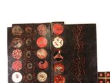 a black book with red and white designs on it