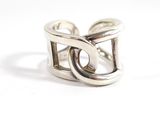 sterling silver ring with a double loop design on a white background
