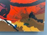 peinture abstraite représentant une personne sur un skateboard, sur un fond bleu