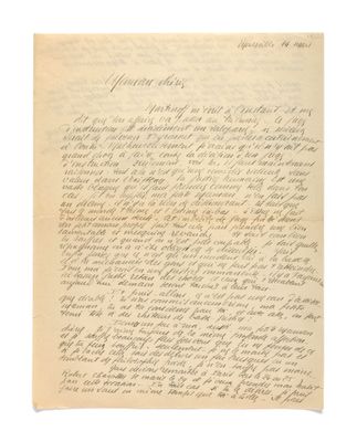 une lettre écrite à l'encre noire sur une feuille de papier