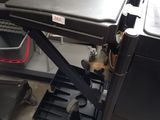 an image of a scissor lift table in a garage