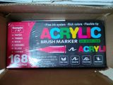 a box of acrylic paint on a cardboard box