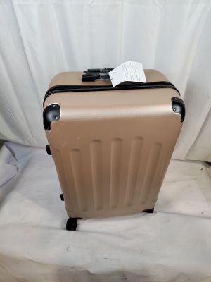 a piece of luggage that is sitting on a bed