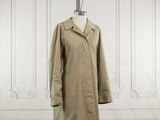 an image of a woman ' s coat on a mannequin