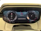 the dashboard of a car with a digital display on it