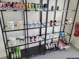 a shelf with many different types of products on it