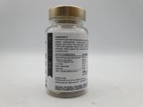a glass jar with a label on it sitting on a table