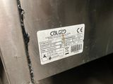 a label on the side of a stainless steel refrigerator