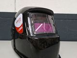 an image of a welding helmet sitting on a table