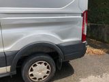 a van that is parked on the side of the road