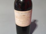 a bottle of wine that is sitting on a table