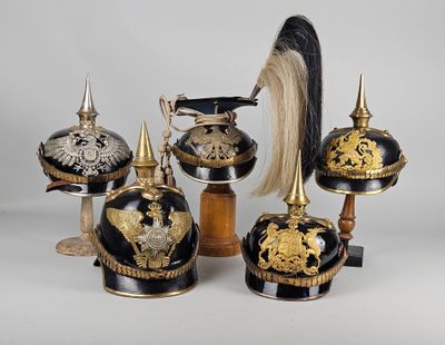 a lot of helmets that are sitting on top of each other