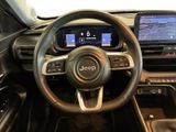 the interior of a car with a steering wheel and dashboard controls