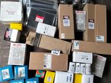 a pile of boxes and packages on the floor