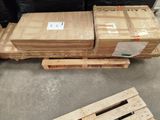 two pallets with boxes stacked on top of each other