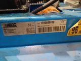 a close up of a blue machine with a price tag on it