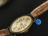 a close up of a wrist watch on a table