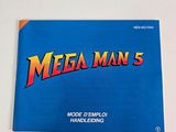 mega man ' s logo on the back of a blue book