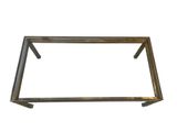 a metal and glass coffee table on a white background