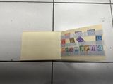a piece of paper with stamps on it on a tiled floor