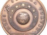 a close up of a coin with a picture of a globe on it