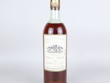 an image of a bottle of wine sitting on top of a table