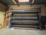 a garage with a rack and a lot of shelves in it