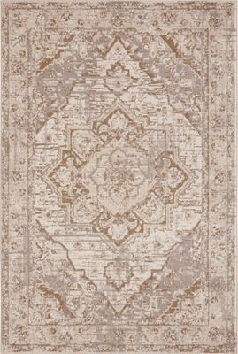 un tapis beige et beige au motif ouvragé