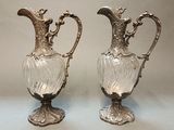 pair of antique silver plated glass vases with handles