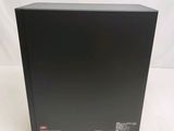 a close up of a black box on a white surface