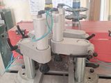 a picture of a machine that is working on a piece of wood