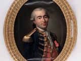portrait of a man in a military uniform in a gold oval frame
