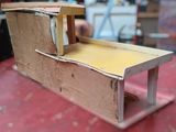 a cardboard model of a desk made out of cardboard