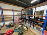 a room with a lot of tools and a lot of shelves
