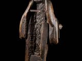 an image of a statue of a man with a beard and a robe