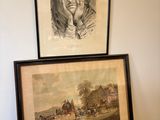 two framed pictures of a man and a woman sitting on a rug